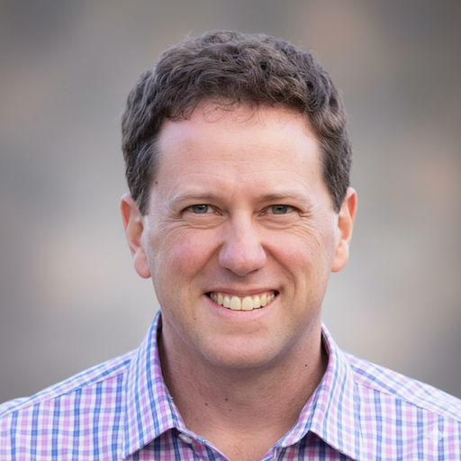 headshot of man smiling
